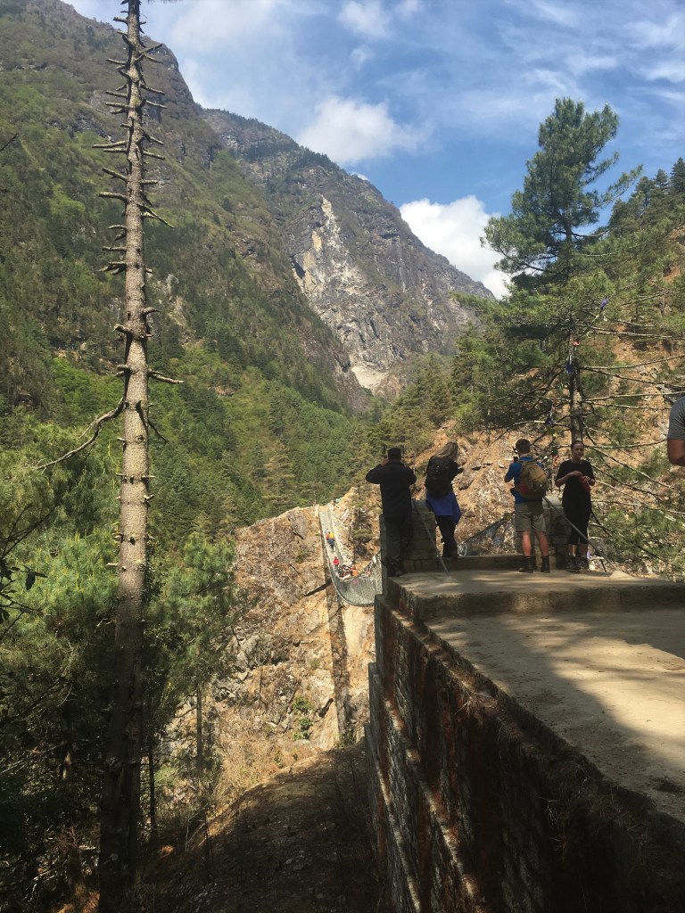 Standing before Hillary suspension bridge