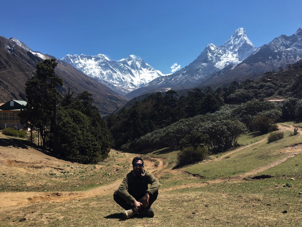 Zach sitting in front of Everest