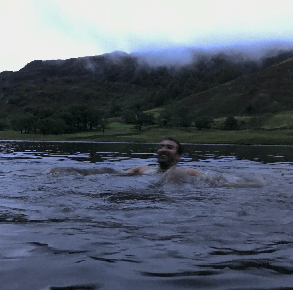 Zach swimming in the small lake